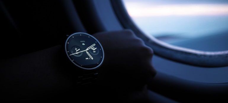 A person wearing a wristwatch.