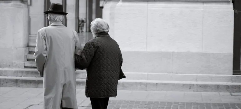 Senior citizens walking down the street.