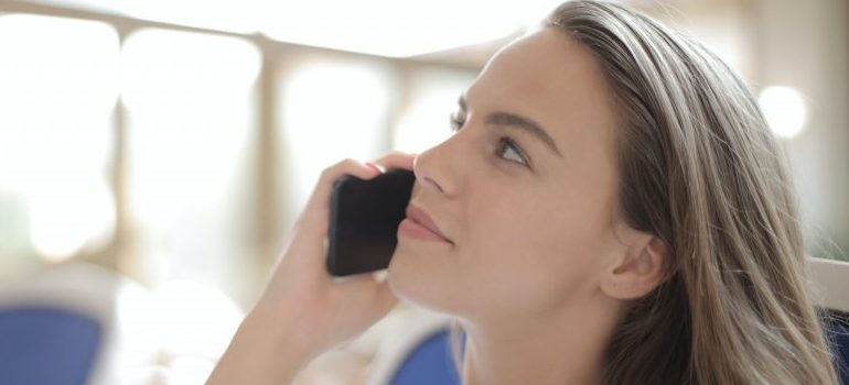 woman speaking over the phone