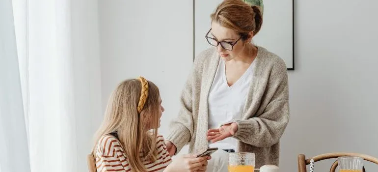 person admonishing a child
