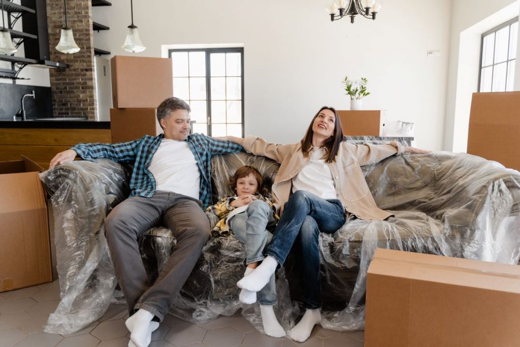 a family relaxing in their new home