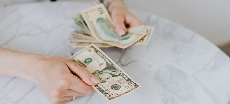 A person counting money.