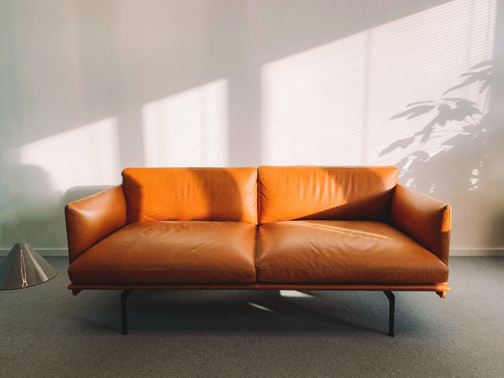 orange leather sofa in a living room