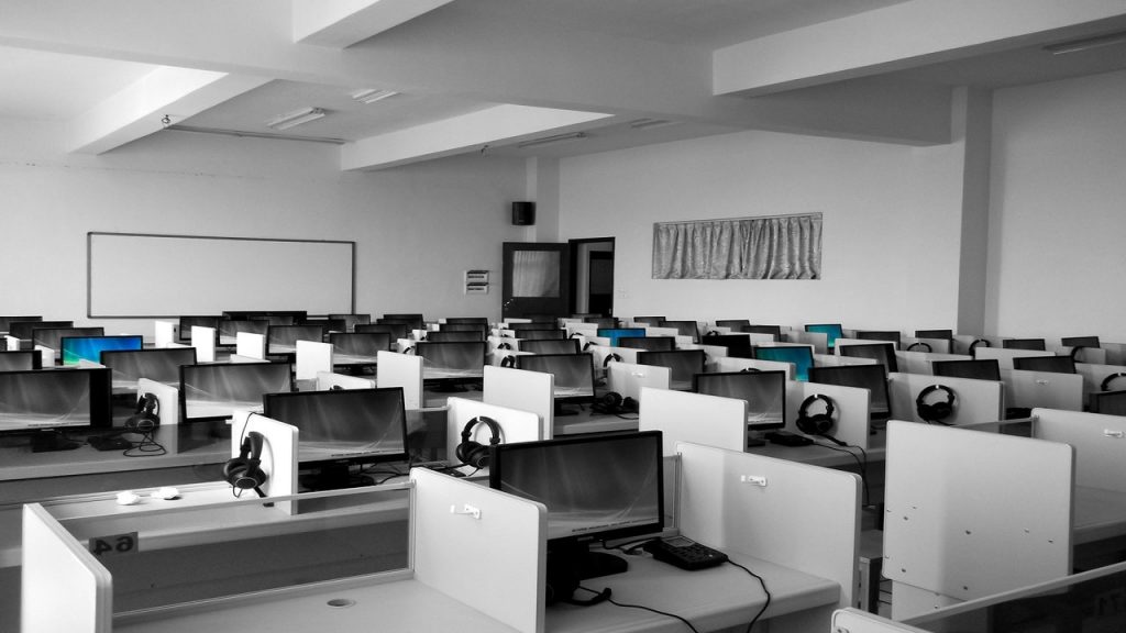 office full of tables and computers