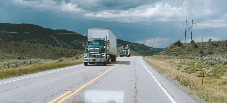 Moving truck driving on the road.