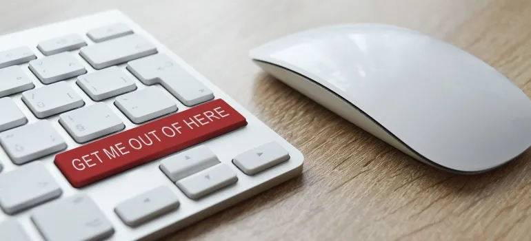 keyboard with a large "get me out of here" button