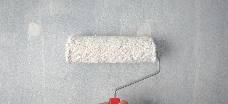 painting a wall before converting your attic into an extra room