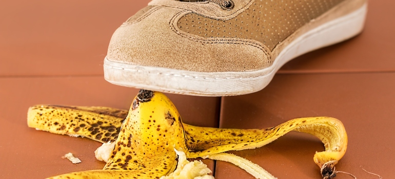 shoe stepping on a banana peel