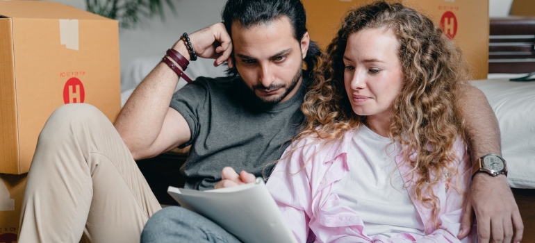 A man and woman asking for a moving estimate