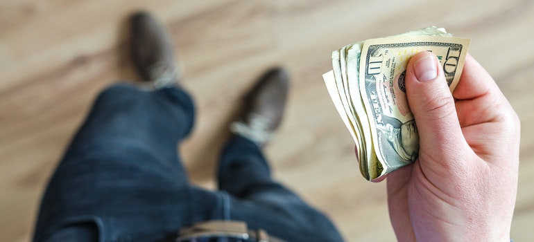 person holding money
