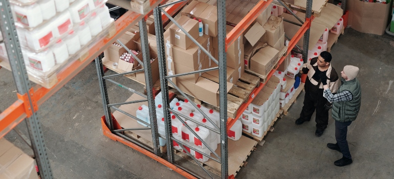 two guys in a warehouse