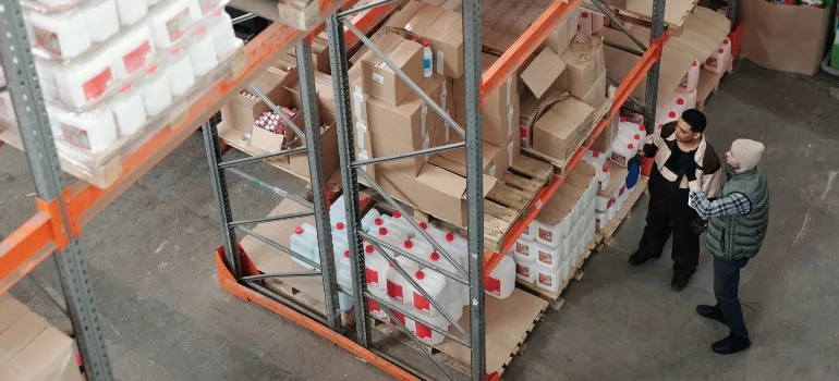 two guys in a warehouse