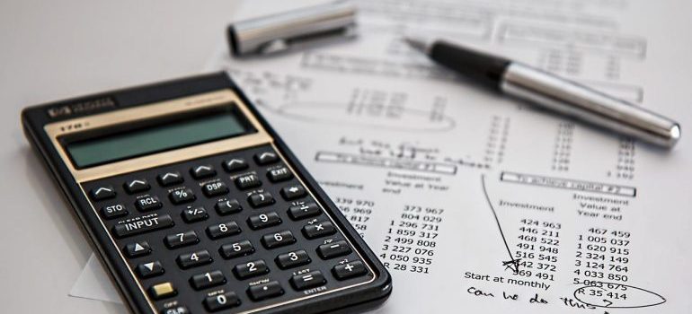 a calculator and a pen