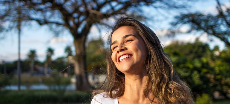 woman happy to be moving out for the first time