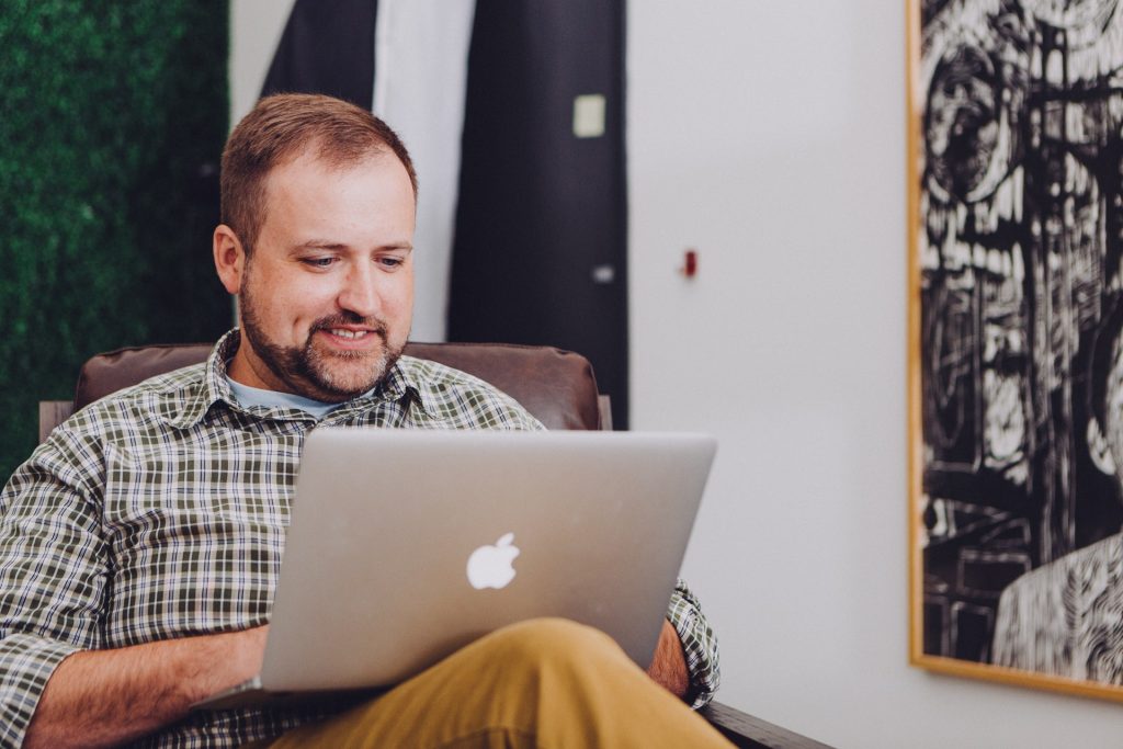 man looking for commercial movers online