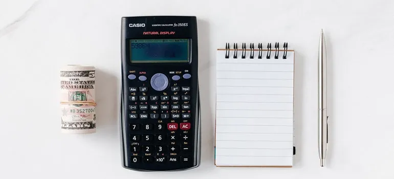 calculator and money on the table