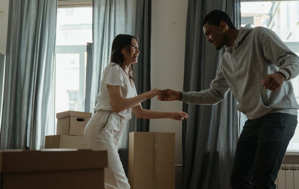 couple dancing after moving in