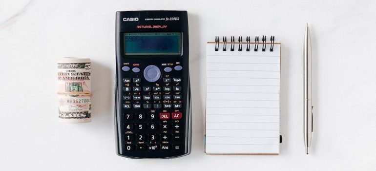 calculator pen and paper