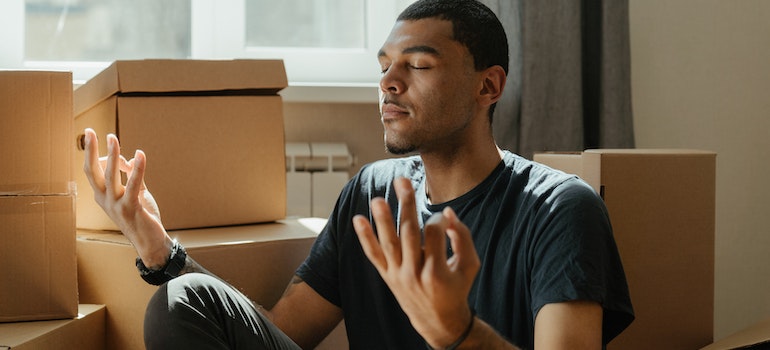 person meditating on how to choose full-service moving vs moving labor Boise