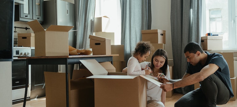 A family is packing for a big relocation.