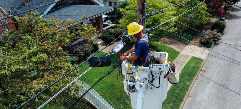 man connecting utilities