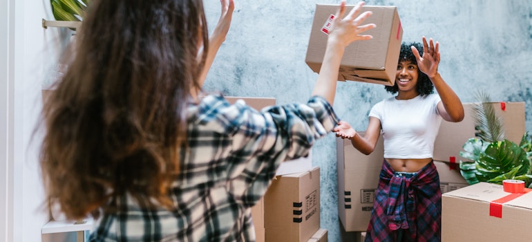 people with moving boxes