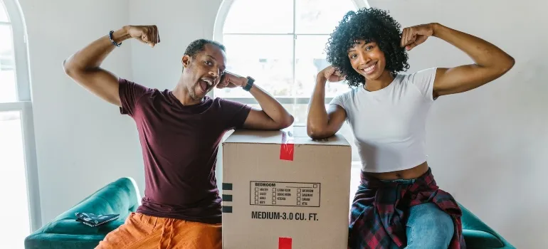 two relaxed people talking about risks of moving without preparation
