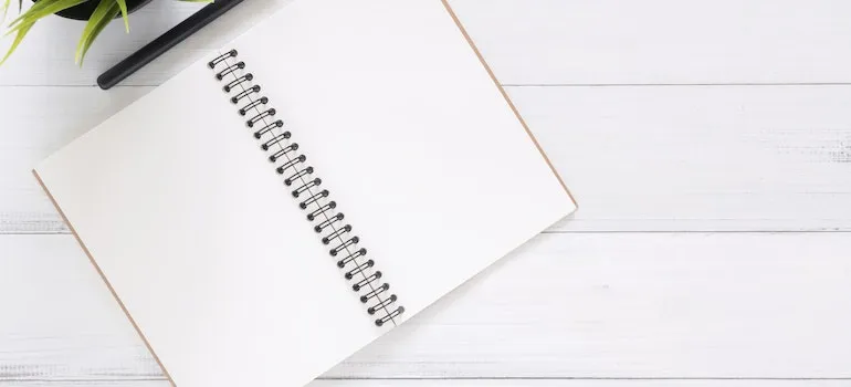 a notebook for planning moving with baby in Idaho
