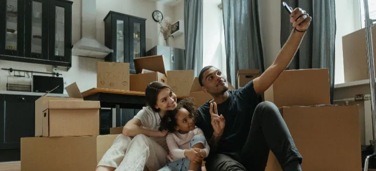 A family having fun during their Kuna relocation
