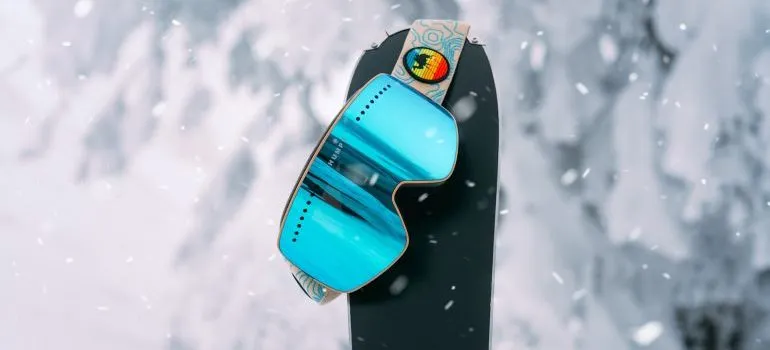 Ski glasses hanging on a ski