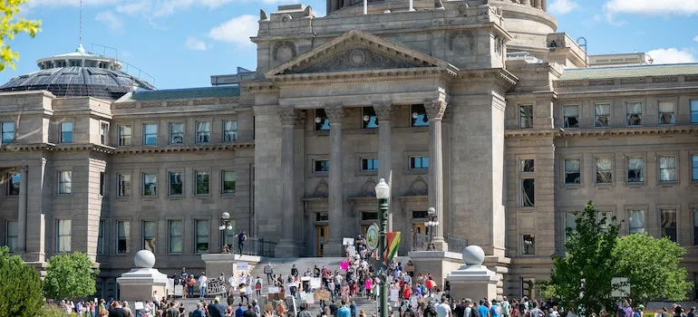 Crowd standing outside Idaho State Capitol palace