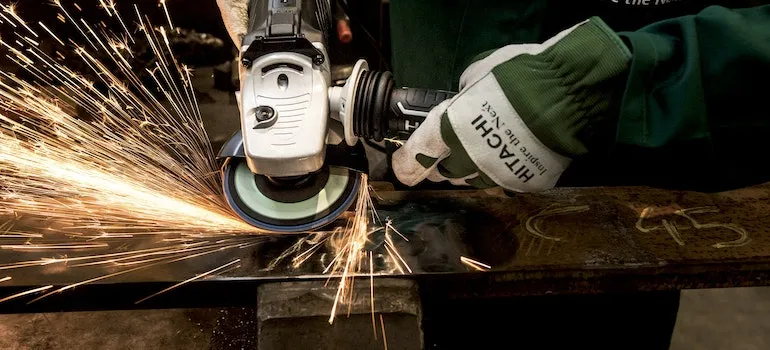 A person creating a workshop home with power tools.