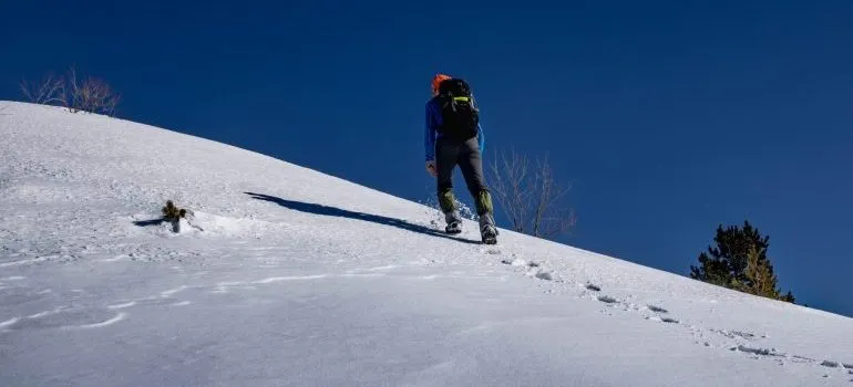 Person hiking in the snow as one of the things to do in Boise this winter