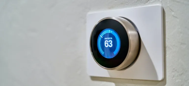Thermostat measuring 63 degrees inside a storage unit
