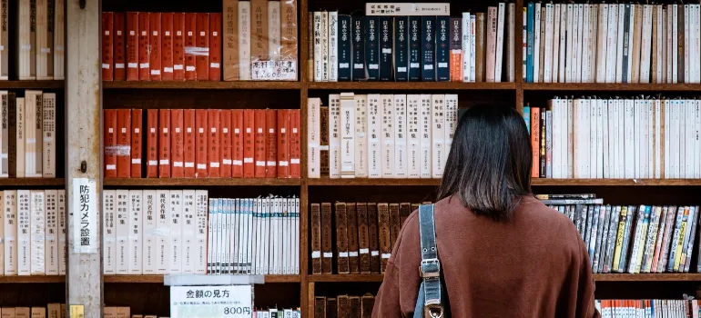 a woman looking at books