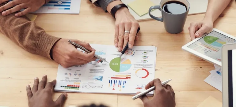 A group of people going over a business plan