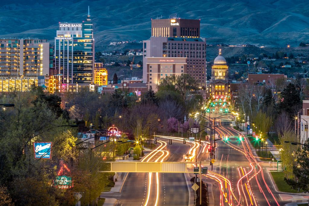 Colorful urban traffic at night in Boise ID