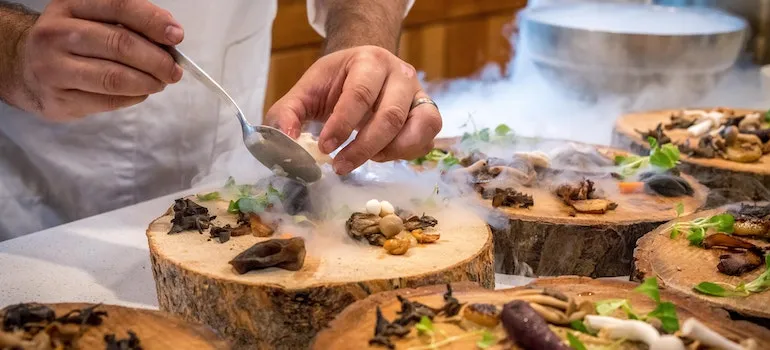 a man making a unique dish at a restaurant