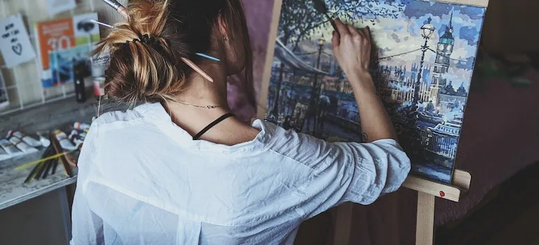 Photo Of Woman In Front Of Painting considering Boise storage facility options