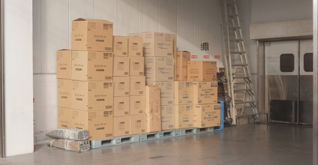 A stack of boxes at the entrance of a Boise self storage facility
