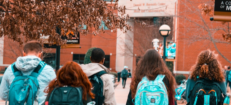 students outside of a school