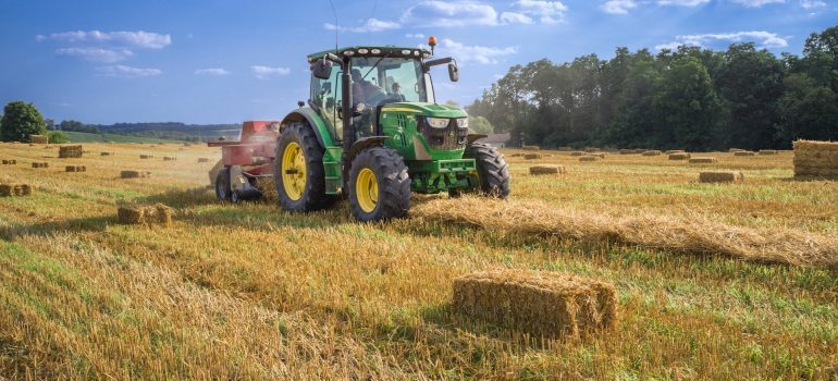 Agricultural vehicle in a field