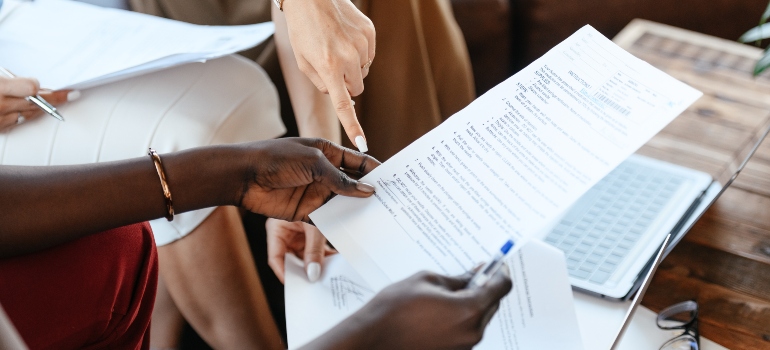People browsing through a document
