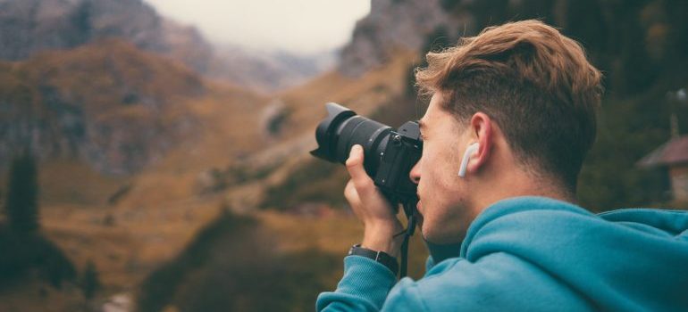 Man taking photos of the nature for the hiker's guide to the Boise Area
