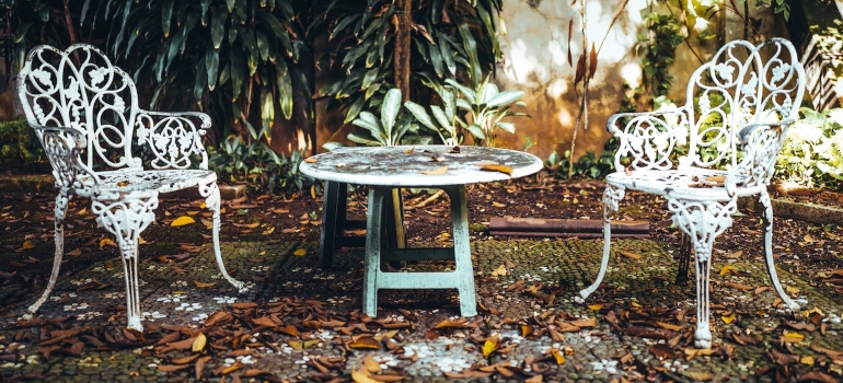 white garden table and two chairs