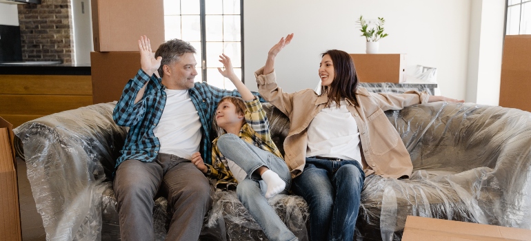 Family celebrating a successful move