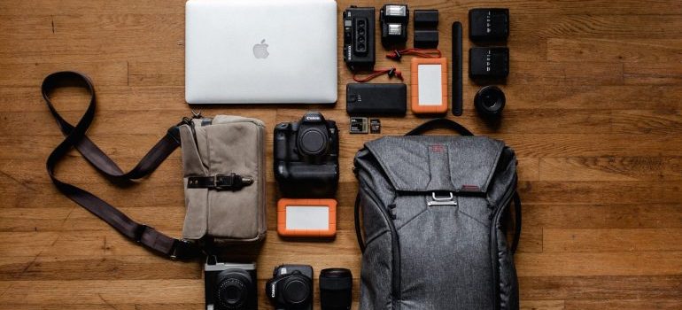 Organized devices on a table ready for you to pack your electronics for a Boise move