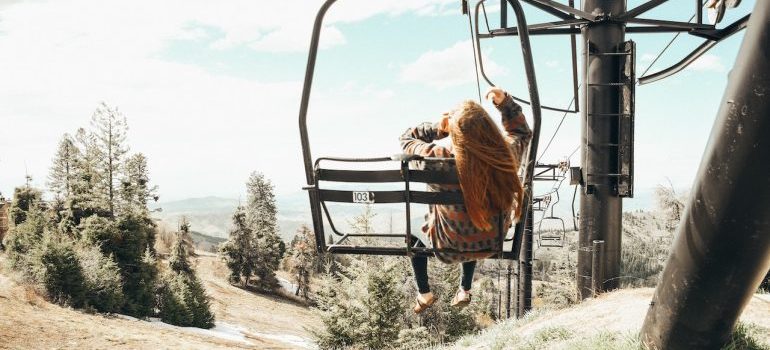 a woman enjoying a ride in Eagle Island State Park, one of the best neighborhoods and attractions in the Boise area