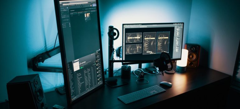 Horizontal and vertical PC screens on a desk