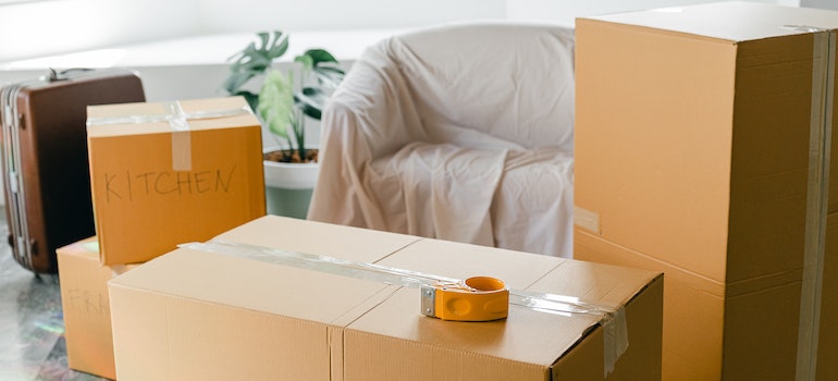 Brown boxes in the middle of a room